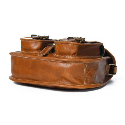 Classy Leather Bags 2-pocket leather sling crossbody bag for women with adjustable strap and compact design.
