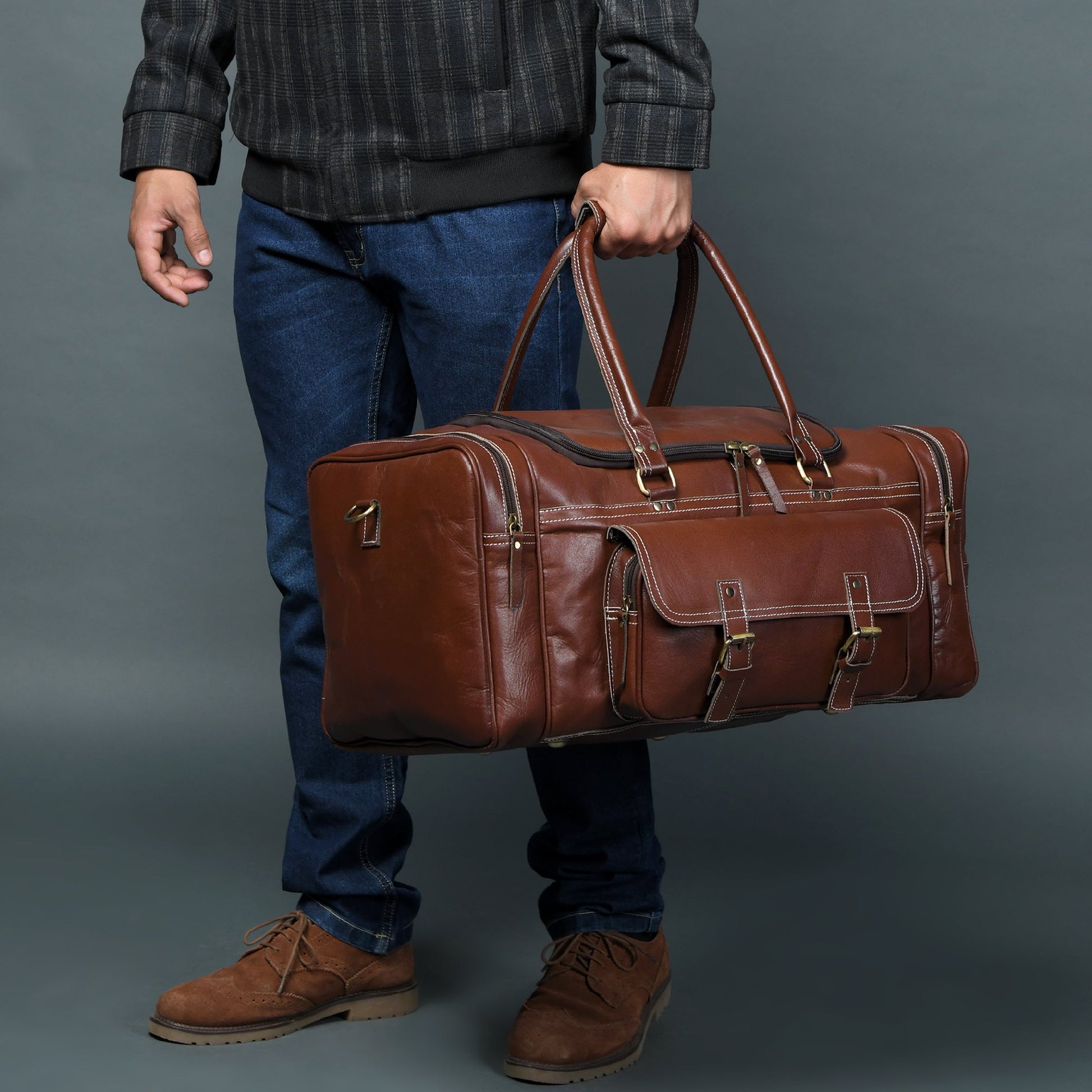 Upgraded Traveler Weekender Duffle bag by Classy Leather Bags, 21-inch carry-on leather duffel with sturdy handles and spacious interior.