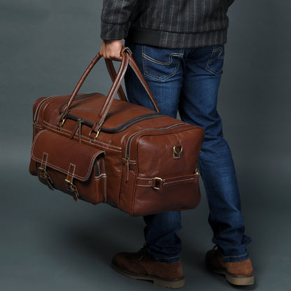 Upgraded Traveler Weekender Duffel Bag by Classy Leather Bags, 21-inch carry-on size in durable leather with top handles and zipper closure.