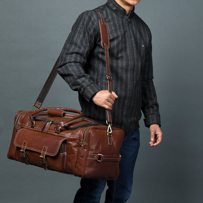 Upgraded Traveler Weekender Duffle bag by Classy Leather Bags, 21-inch carry-on size, made of durable leather with adjustable straps.