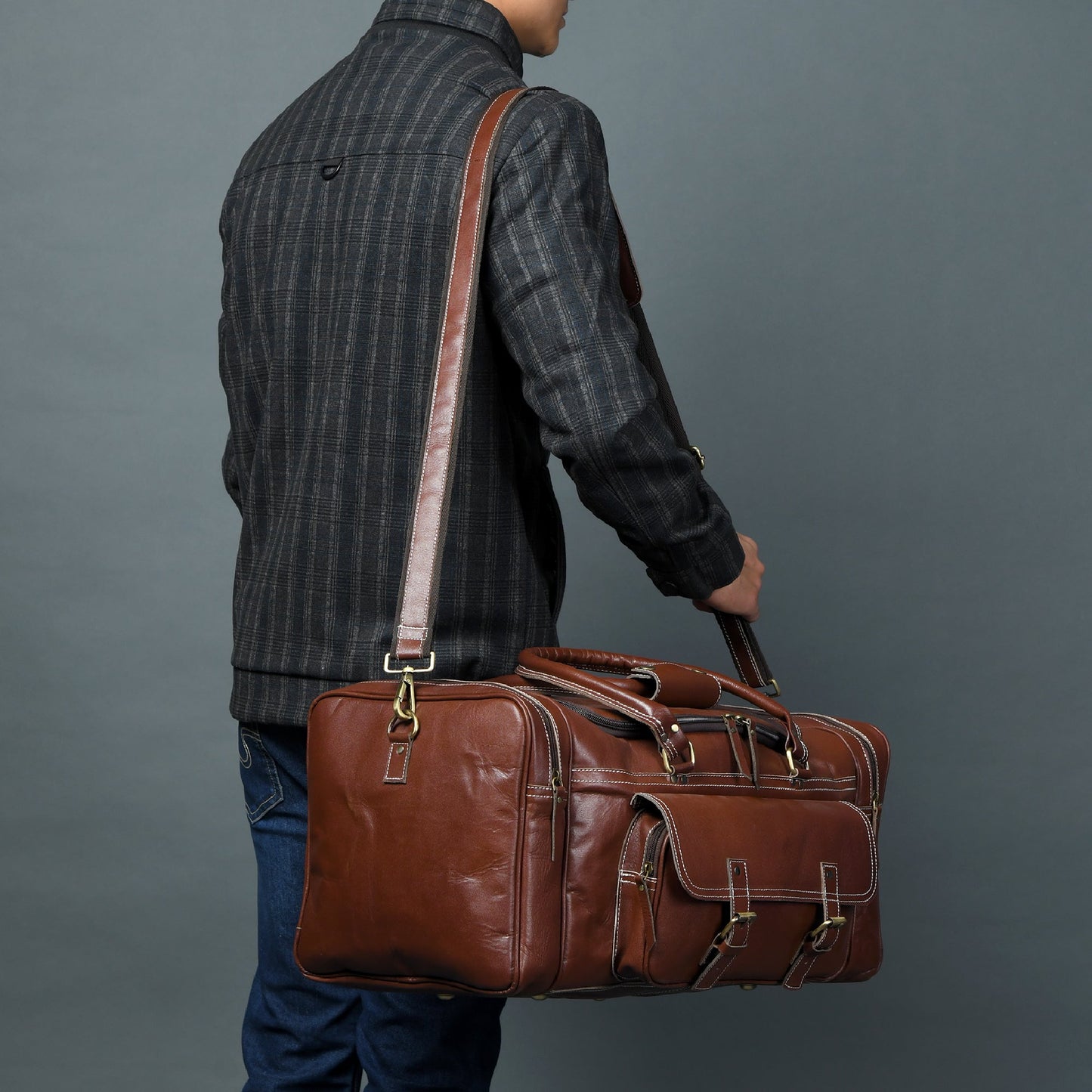 Upgraded Traveler Weekender Duffel Bag by Classy Leather Bags, 21-inch carry-on with leather handles and spacious interior.
