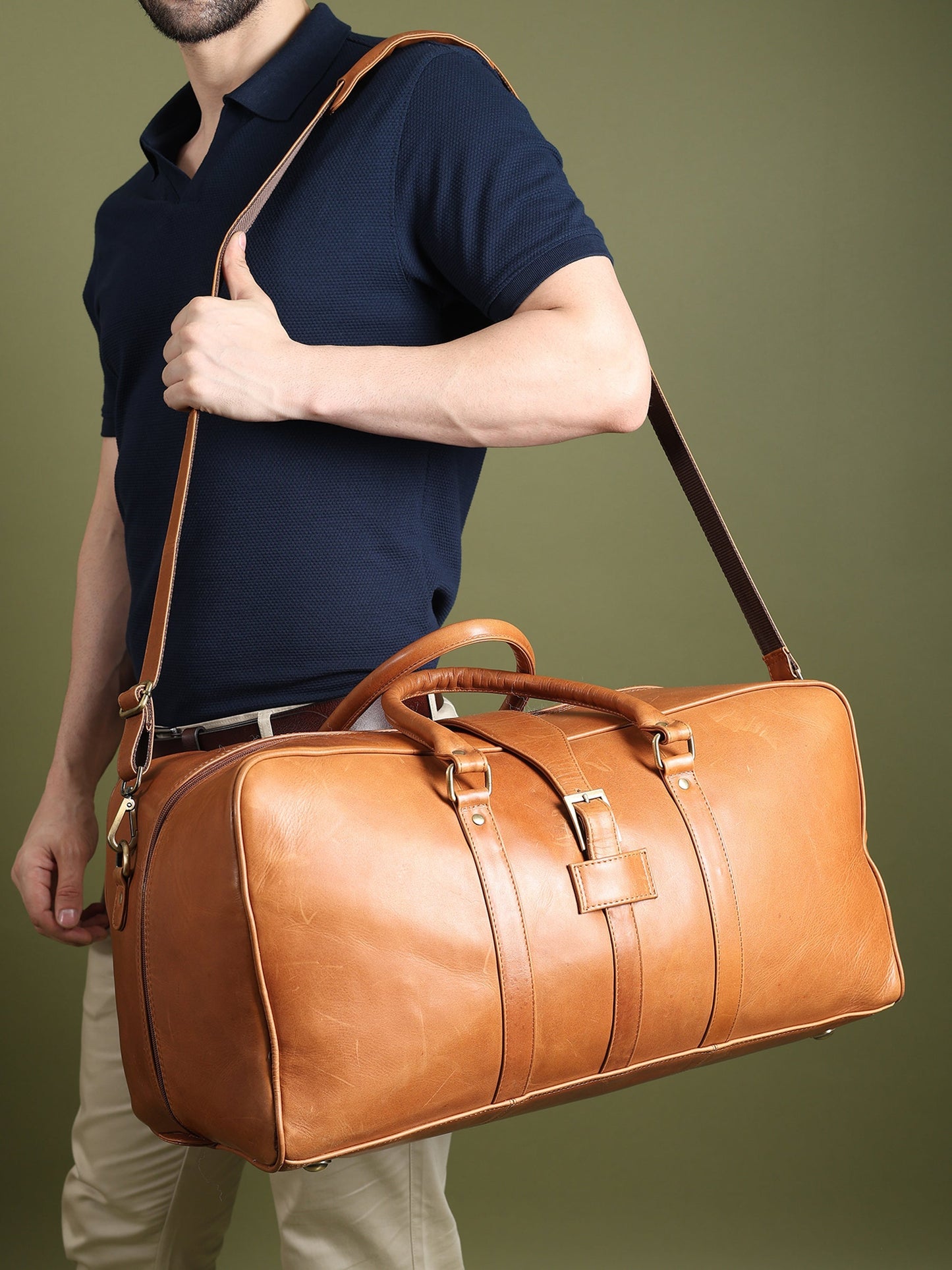 Port Blair Leather Duffle Travel Bag by Classy Leather Bags, showcasing the stylish brown leather duffel with sturdy handles.