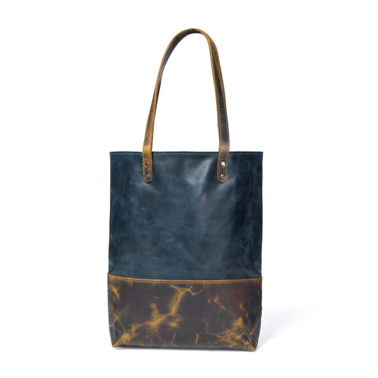 Blue women's leather tote handbag by Classy Leather Bags, featuring a spacious design and sturdy leather construction.