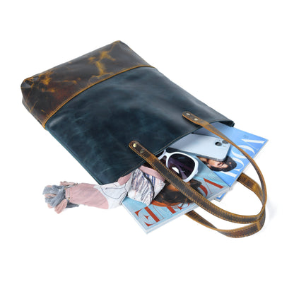 Blue women's leather tote handbag by Classy Leather Bags, featuring a spacious design and sturdy leather construction.