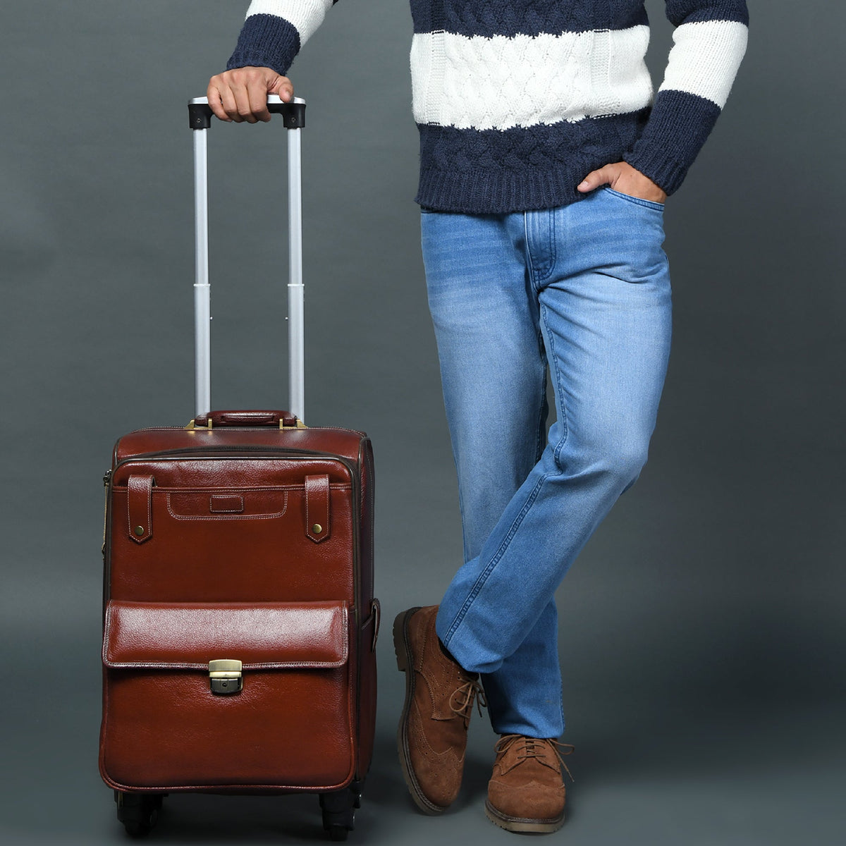 Leather carry-on trolley bag by Classy Leather Bags, with sturdy handles and smooth wheels for travel convenience.