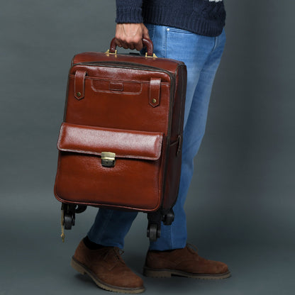 Leather carry-on trolley bag by Classy Leather Bags, featuring sturdy handles and smooth wheels for travel convenience.