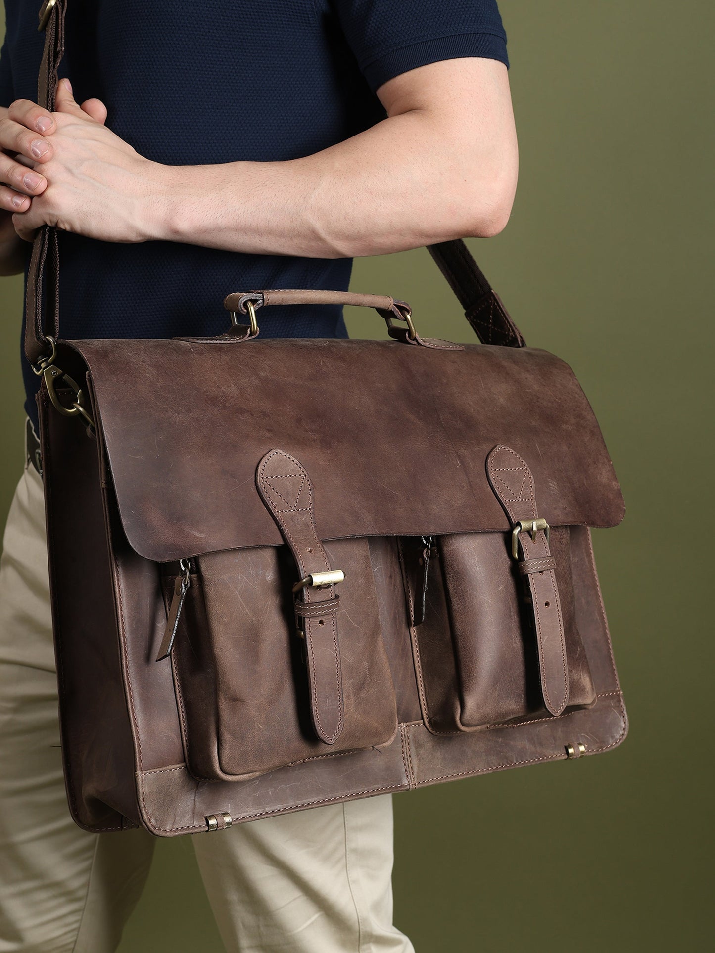 Classy Leather Bags 15-inch buffalo leather messenger bag with adjustable strap and multiple compartments for everyday use.
