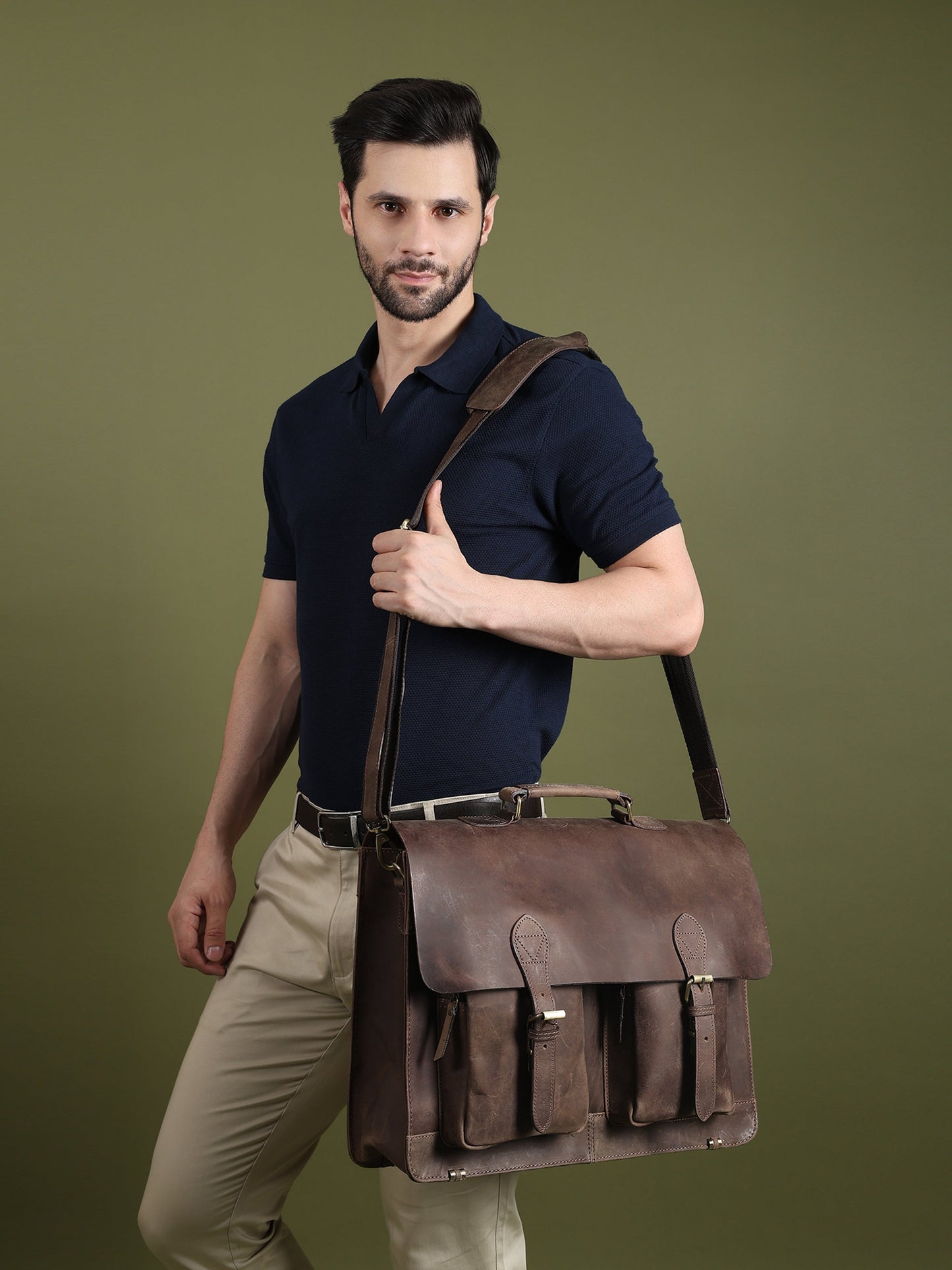 Classy Leather Bags 15-inch buffalo leather messenger bag with adjustable strap and multiple compartments for everyday use.