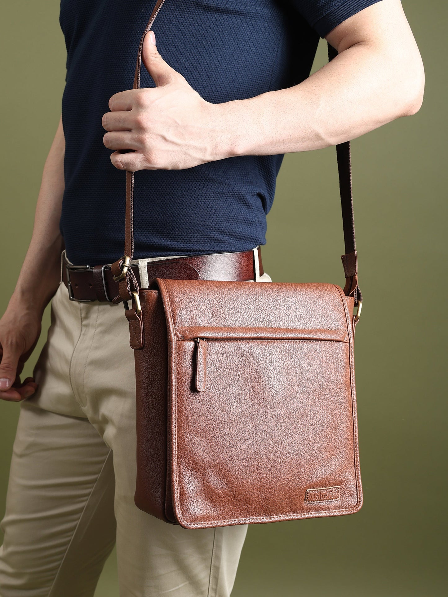 Classy Leather Bags leather crossbody messenger bag for travel and work, featuring a sleek design with adjustable strap and multiple compartments.