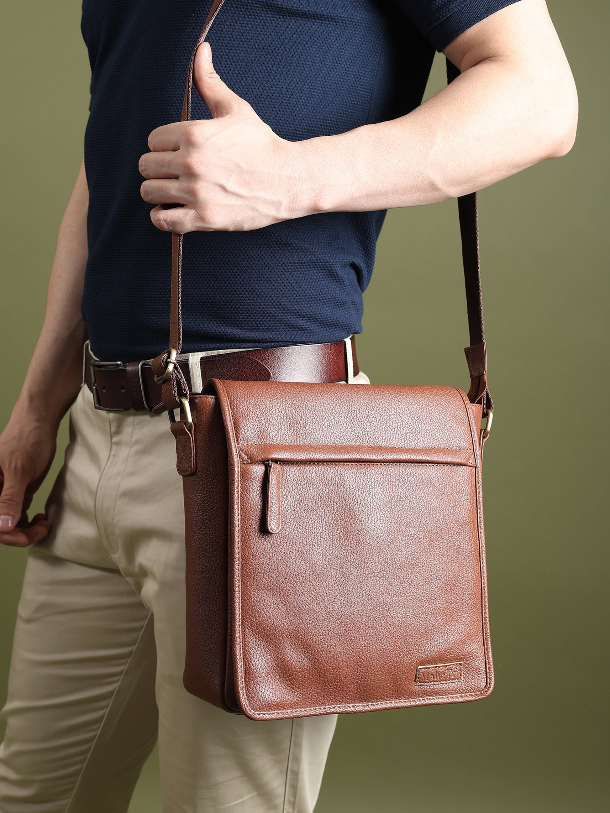 Classy Leather Bags leather crossbody messenger bag for travel and work, featuring a sleek design with adjustable strap and multiple compartments.