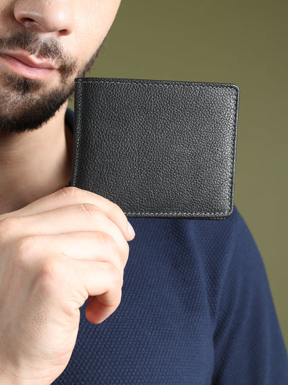 Black textured leather men's wallet from Classy Leather Bags, showcasing a sleek, durable design with multiple card slots.
