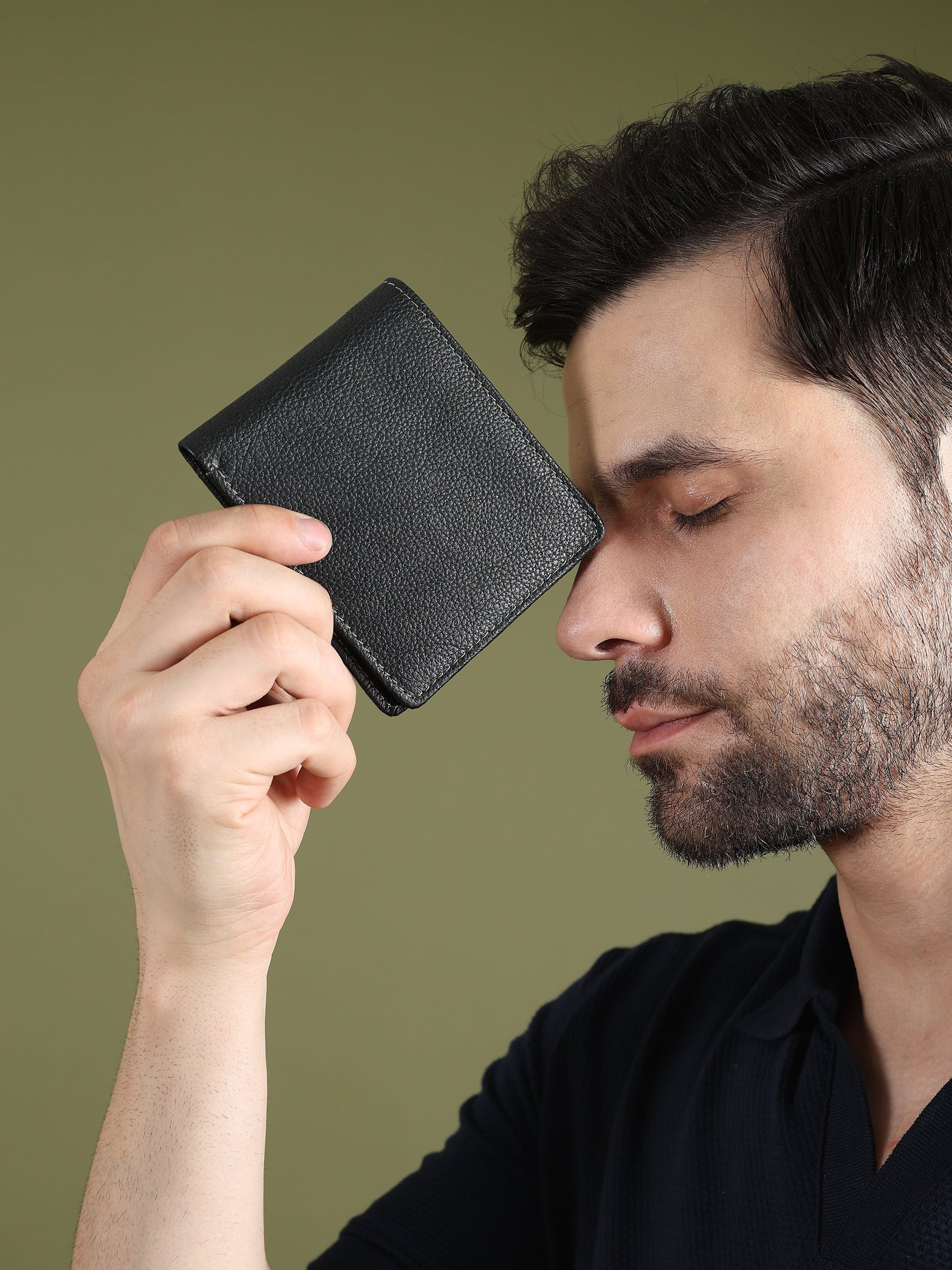 Black textured leather men's wallet from Classy Leather Bags, featuring multiple card slots and a sleek, stylish design.