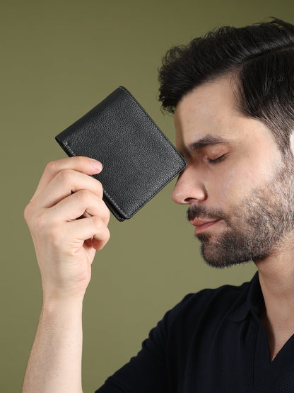 Black textured leather men's wallet from Classy Leather Bags, featuring multiple card slots and a sleek, stylish design.