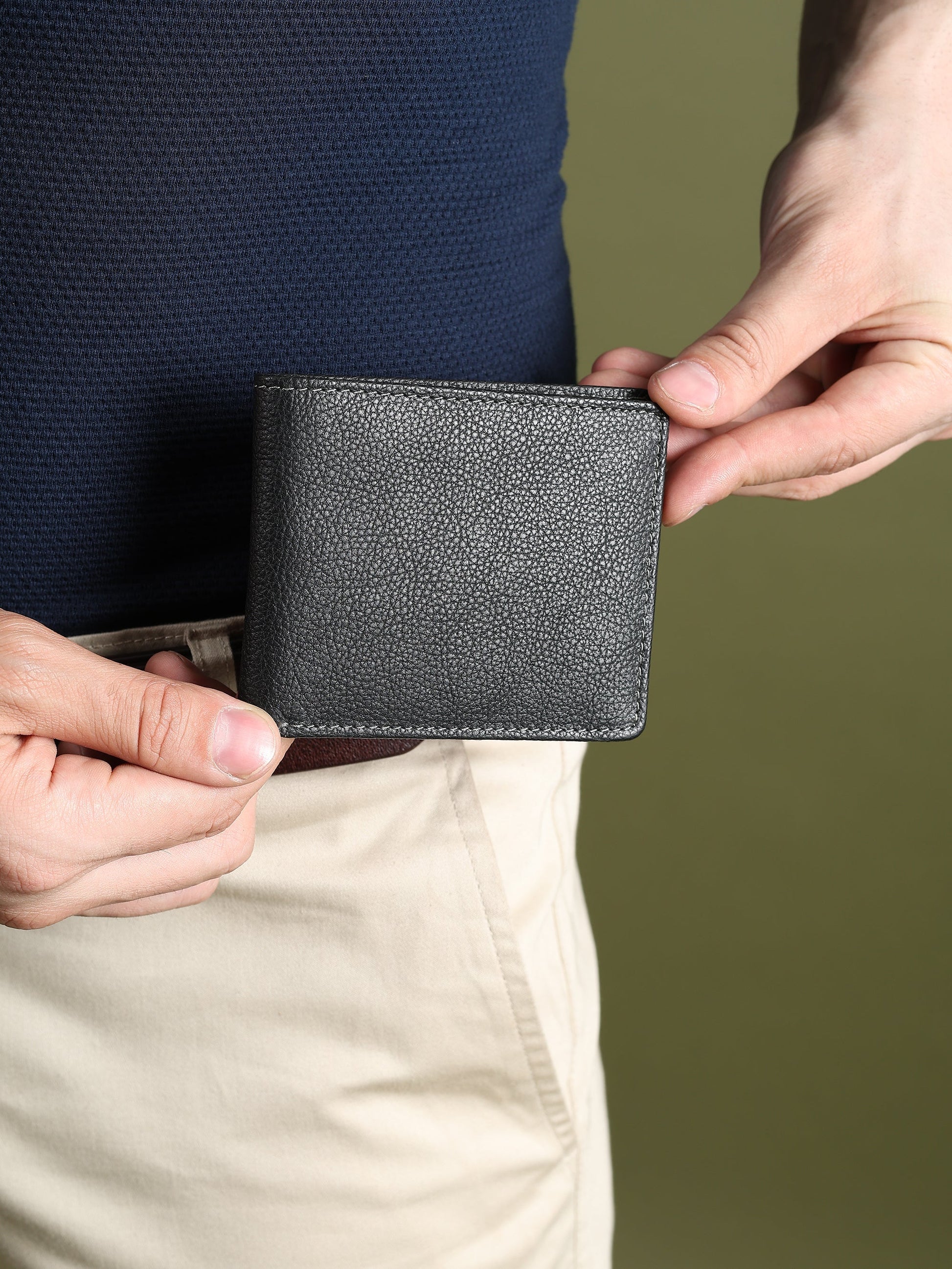 Black textured leather men's wallet from Classy Leather Bags, showing multiple card slots and sleek design.