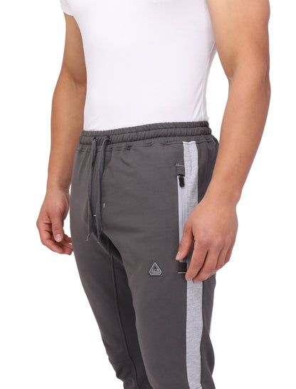 Close-up of SCR Sportswear Infinite Flex Tall Fit men's joggers sweatpants showing fabric texture and waistband detail.