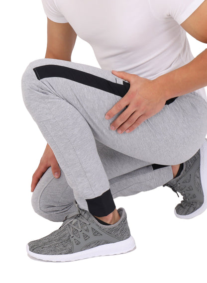 Close-up of SCR Sportswear Infinite Flex Tall Fit men's joggers sweatpants showing soft fabric and tapered leg design.