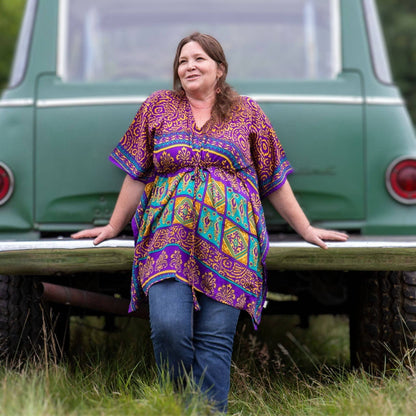 Darn Good Yarn Surplus Aanya Adjustable Short Kaftan in warm tones, lightweight clothing with a relaxed fit and colorful pattern.