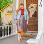 Boho reclaimed sari wrap skirt by Darn Good Yarn in cool tea tones, showcasing vibrant fabric and relaxed, stylish fit.