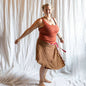 Darn Good Yarn Made With Love original saree wrap skirt in warm tones, showcasing a vibrant, flowing clothing accessory.