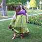 Darn Good Yarn Made With Love sari wrap skirt in warm tones, showcasing its flowing fabric and stylish design.