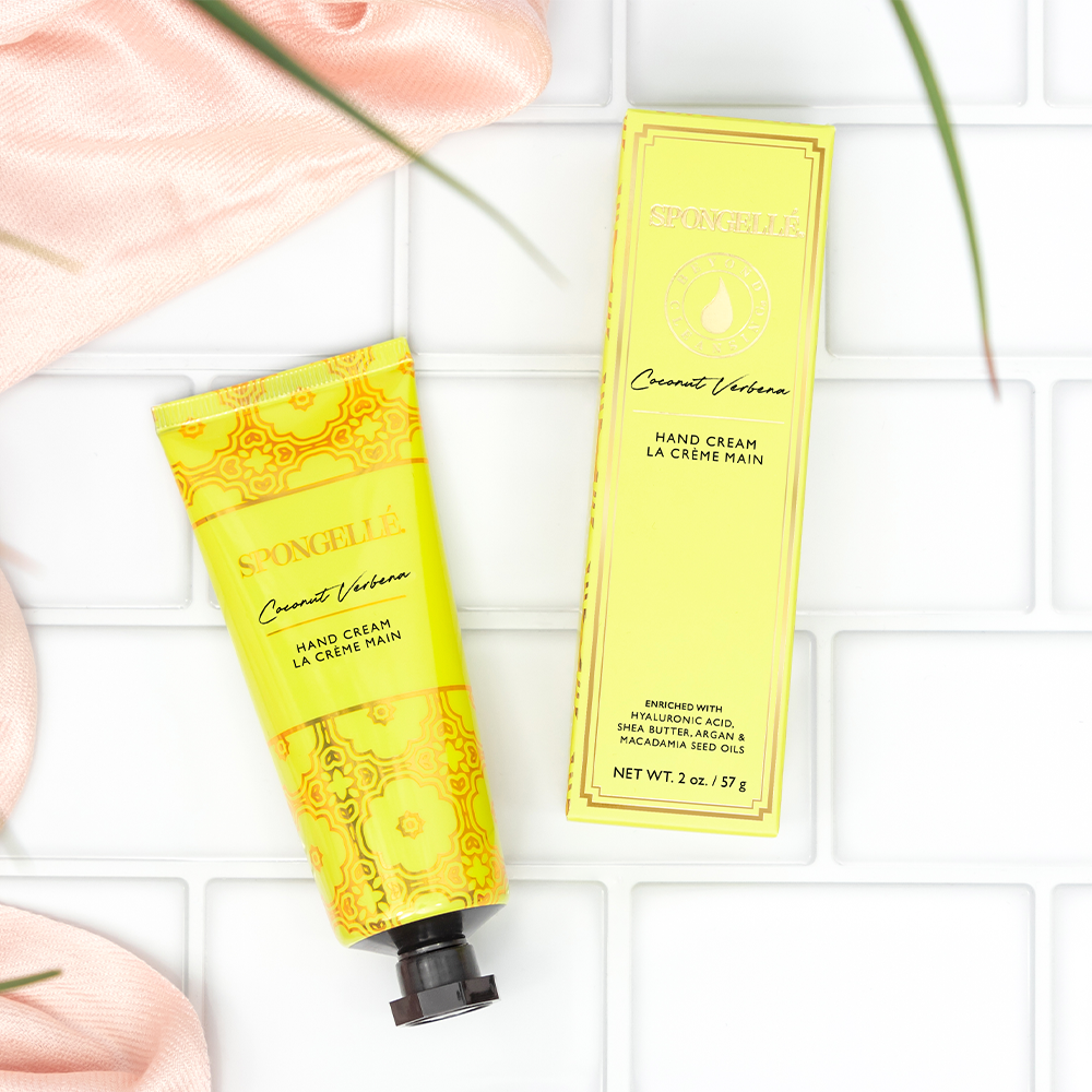Spongellé Coconut Verbena hand cream tube with floral and coconut scent, featuring a sleek design and creamy texture.