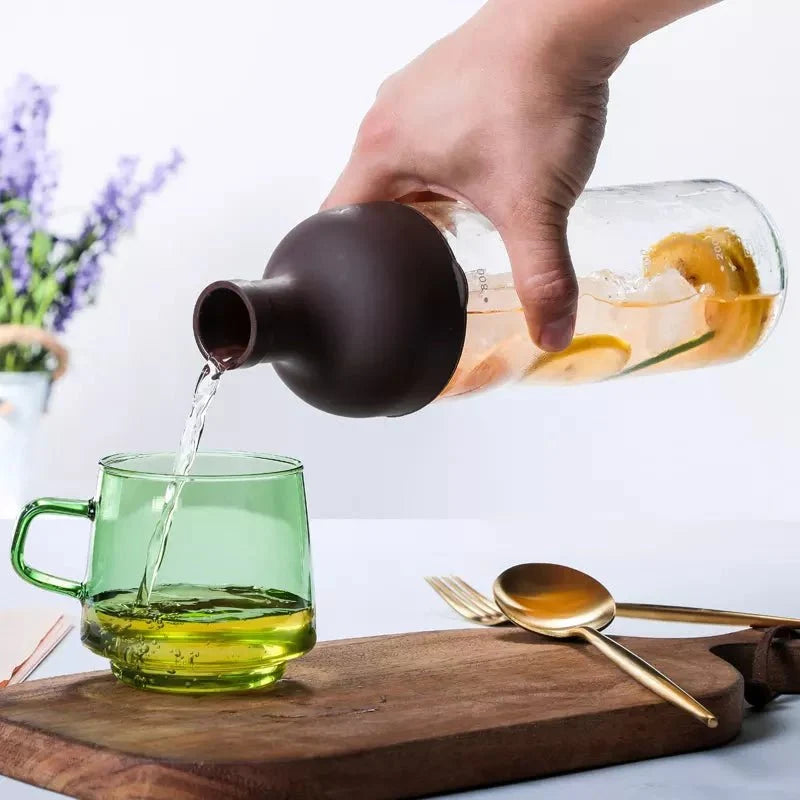Nepal Tea Cold Brew Infuser Bottle with stainless steel infuser for making cold brew tea or coffee at home.