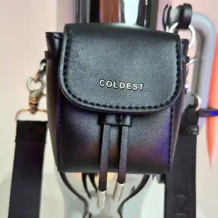 Coldest mini backpack with squeeze holder, key hanger, and mint box in midnight black, compact and stylish for everyday use.