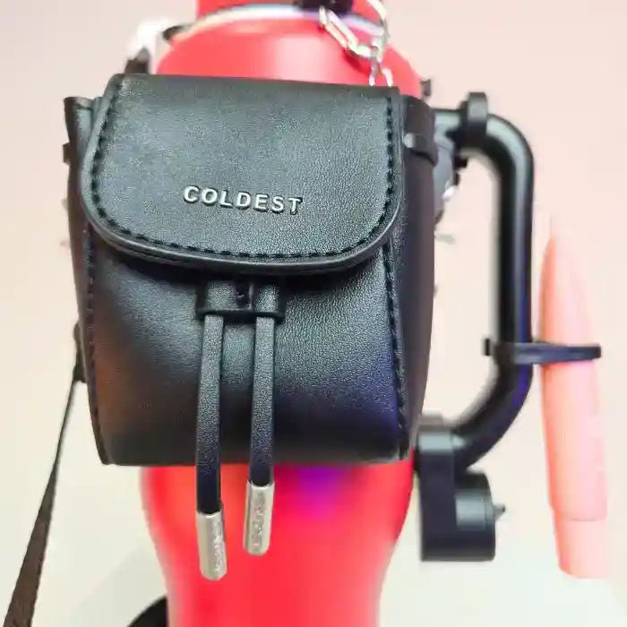 Coldest mint-colored mini backpack with squeeze holder and key hanger, shown with a matching mint box.