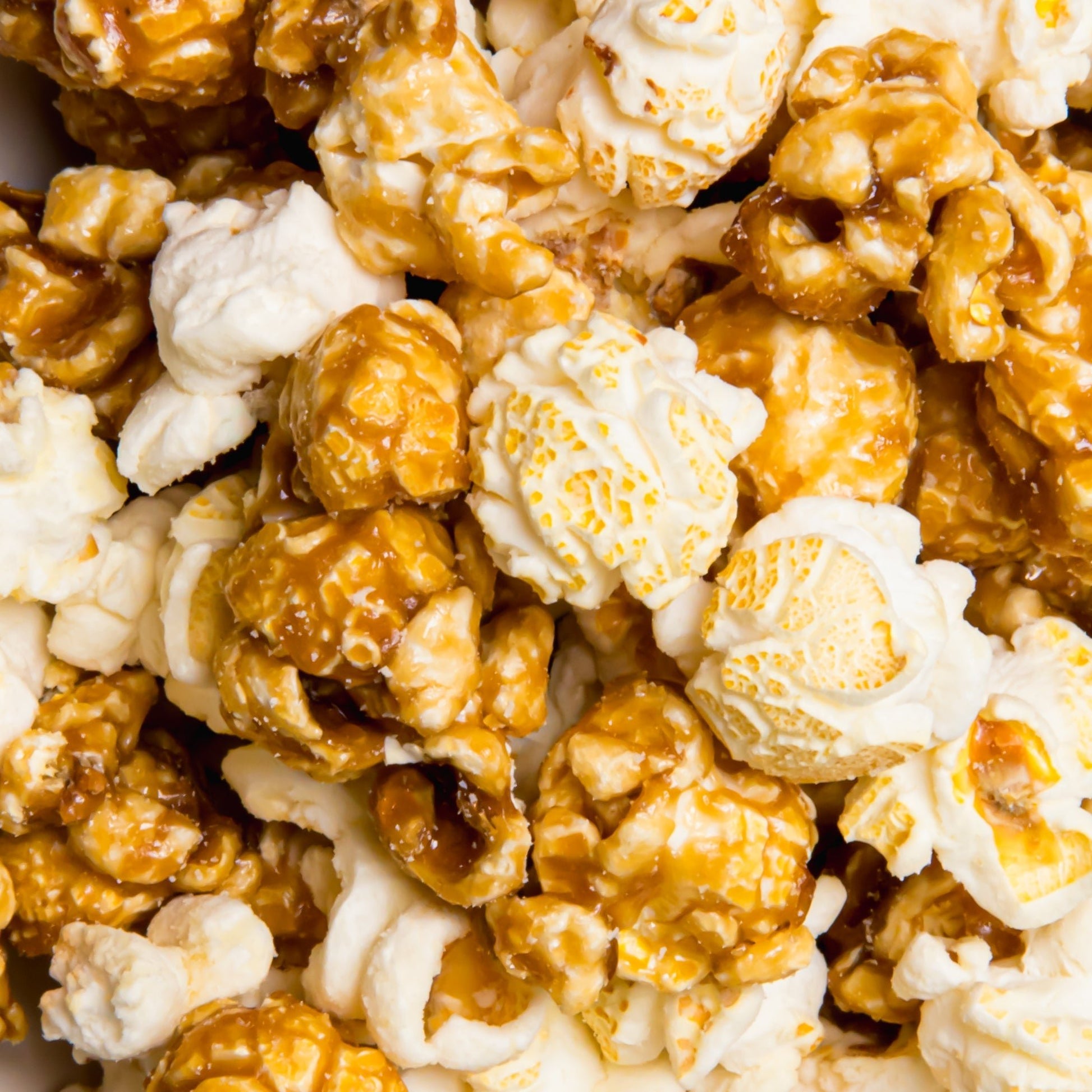 Colorado Style Popcorn by Colorado Popcorn Company in a 4 oz bag with colorful packaging and fresh, fluffy popcorn inside.