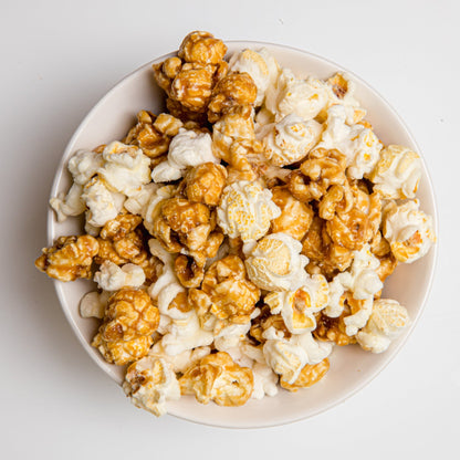Colorado Style Popcorn by Colorado Popcorn Company in a 4 oz bag with colorful packaging and popcorn kernels visible inside.