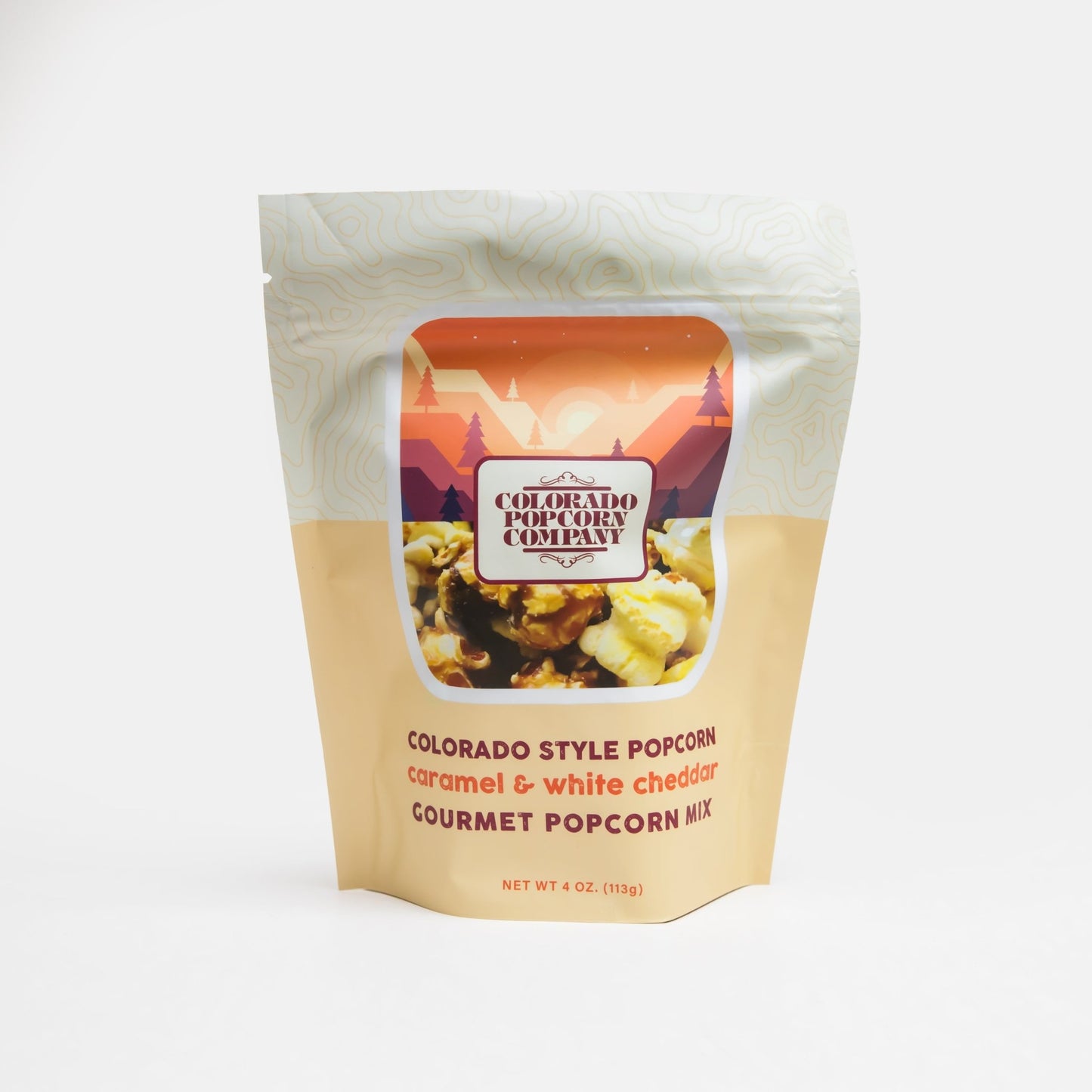 Colorado Style Popcorn from Colorado Popcorn Company in a 4 oz bag, featuring a seasoned, flavorful popcorn snack.