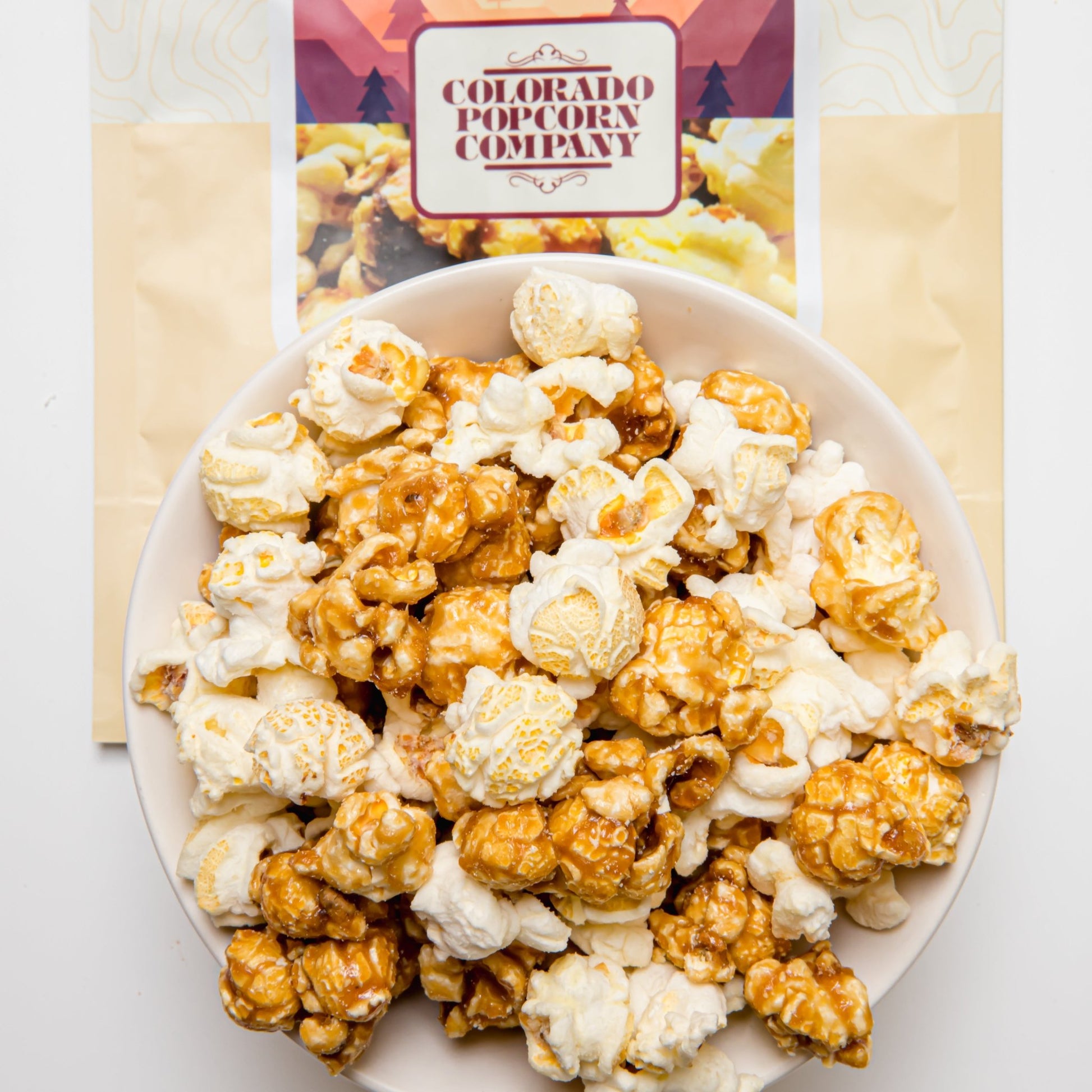 Colorado Style Popcorn by Colorado Popcorn Company in a 4 oz bag, featuring seasoned, crunchy popcorn with bold flavors.