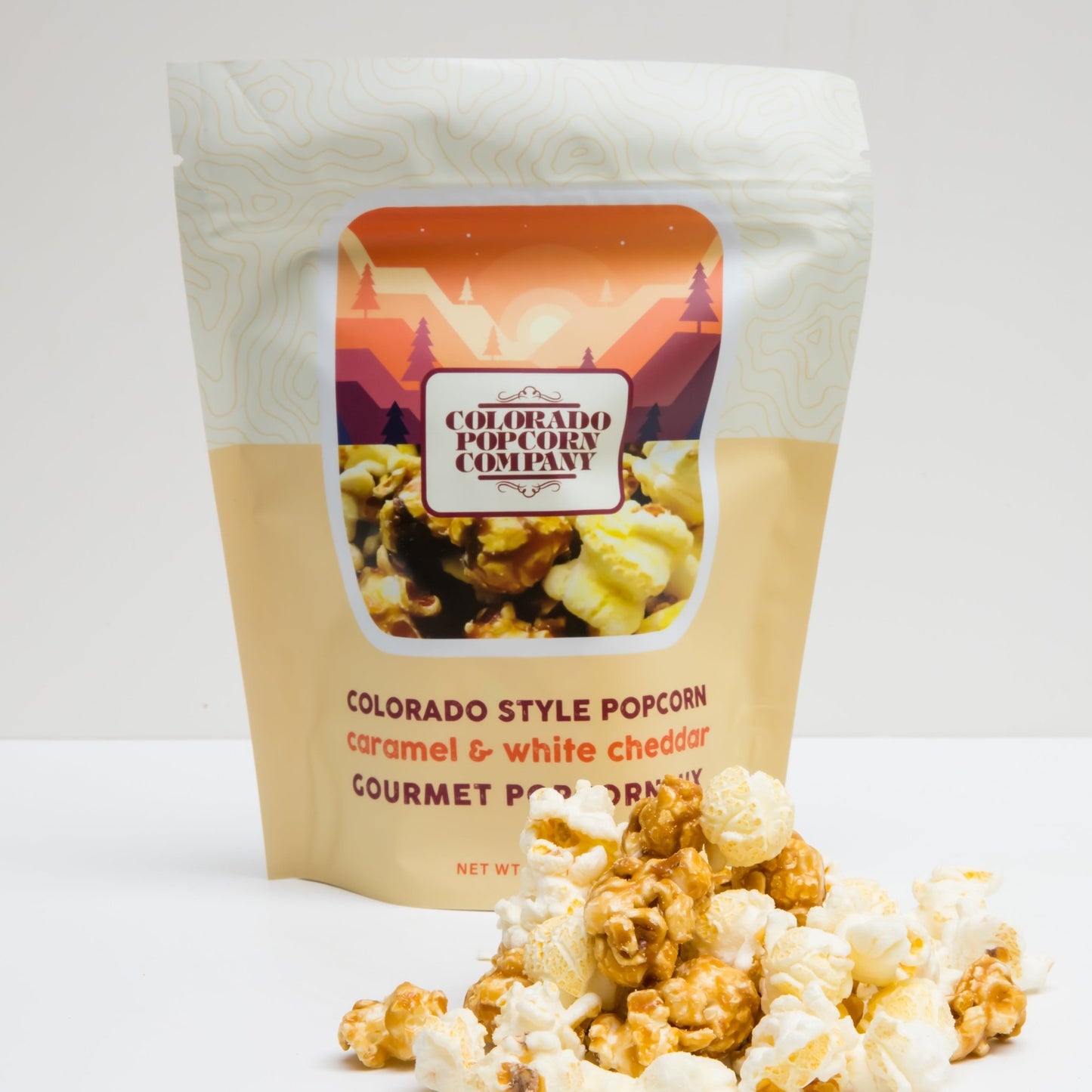 Colorado-style popcorn in a 4 oz bag from Colorado Popcorn Company, featuring a buttery, flavorful popcorn snack.