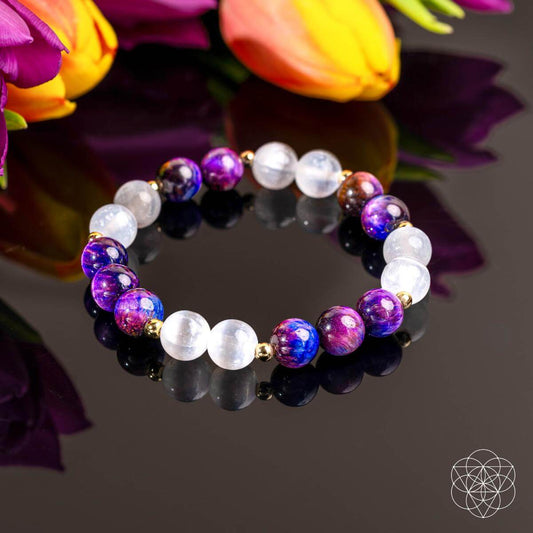 Galaxy Tiger’s Eye bracelet from Conscious Items featuring cosmic energy amplifier and polished tiger’s eye stones.