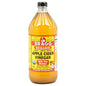 Organic apple cider vinegar from Country Life Natural Foods in a 32 oz bottle, showing the clear, amber-colored liquid inside