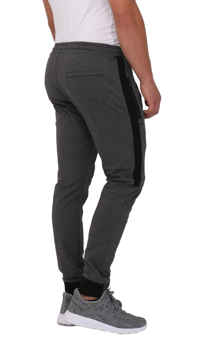 Dark grey SCR Sportswear Infinite Flex Tall Fit men's joggers sweatpants, back view showing relaxed fit and comfortable design.