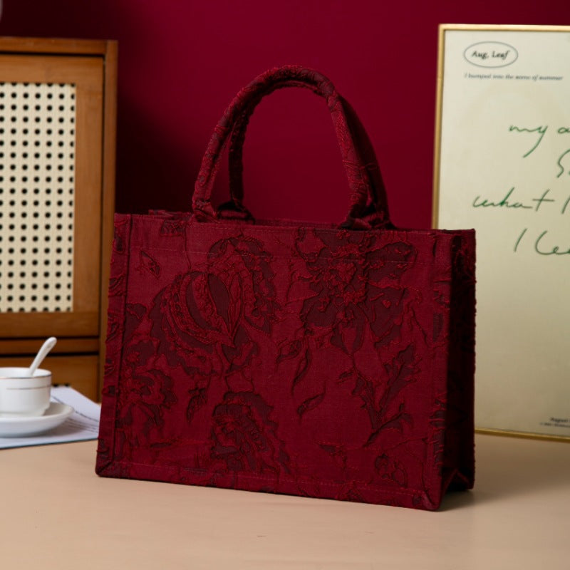 Relief-printed souvenir canvas gift bag with textured design