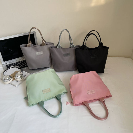 Fashionable women's casual fabric tote bag, versatile commuter handbag with spacious interior and comfortable handles