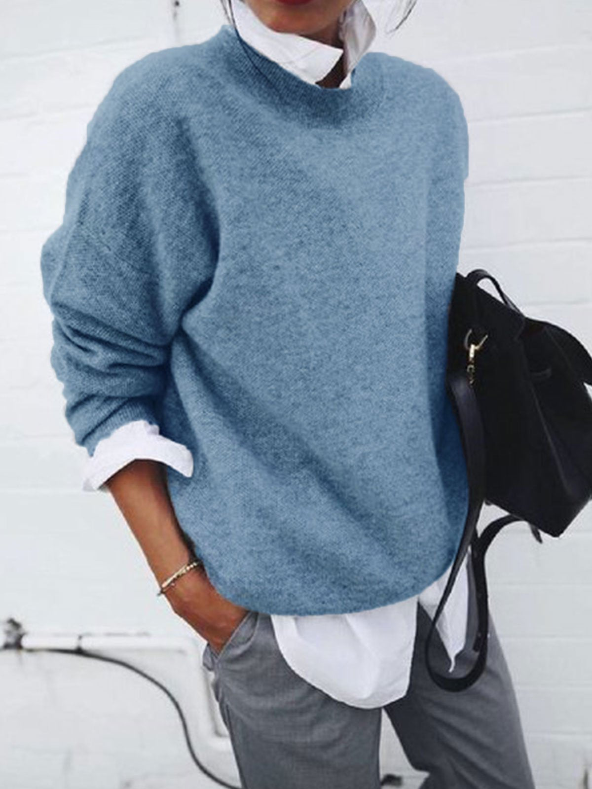 Women's solid color knitted pullover sweater with long sleeves for fall and winter fashion