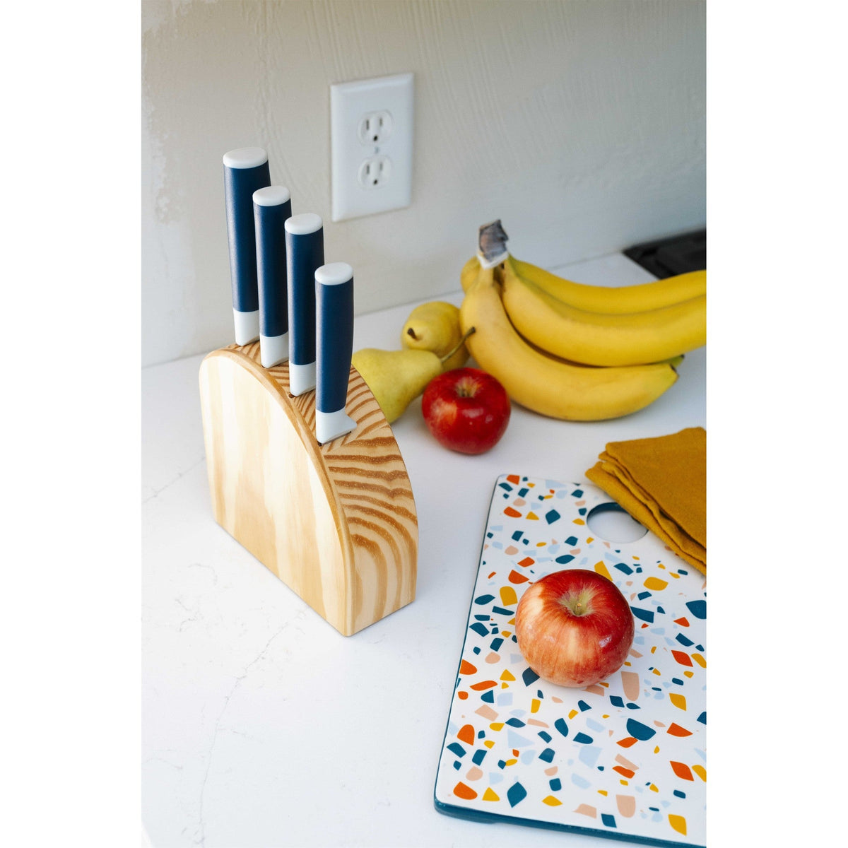 Dura Living DUO-GRIP 5-piece kitchen knife starter set with stainless steel blades and ergonomic handles on a wooden surface.