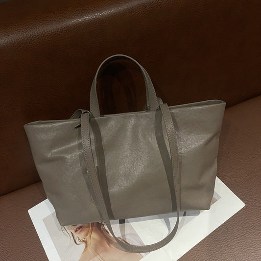 Genuine leather women's tote bag in soft vintage cowhide with underarm shoulder strap and large capacity