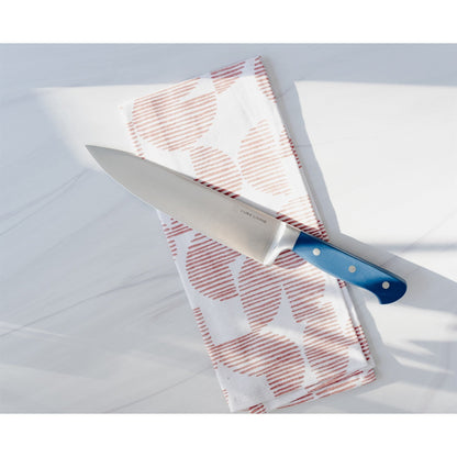 Dura Living Superior 8-inch chef knife with a royal blue handle, showcasing its sharp stainless steel blade and ergonomic design.