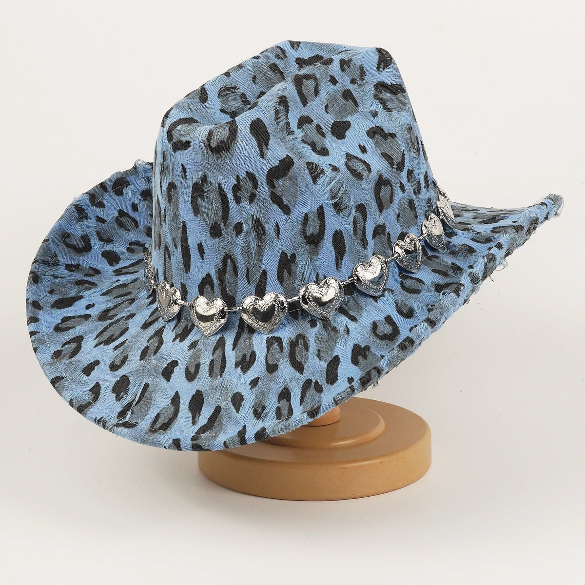 Black leopard-print denim hat, unisex style, featuring a curved brim and textured fabric pattern