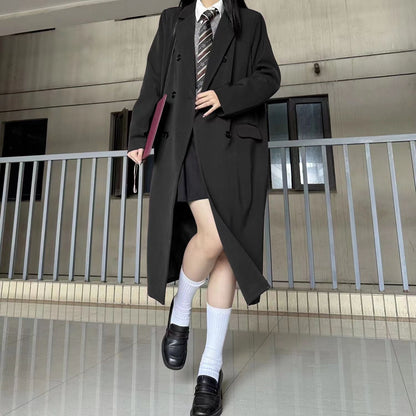 Black long suit trench coat for women, spring and autumn outerwear with tailored lapels and button front