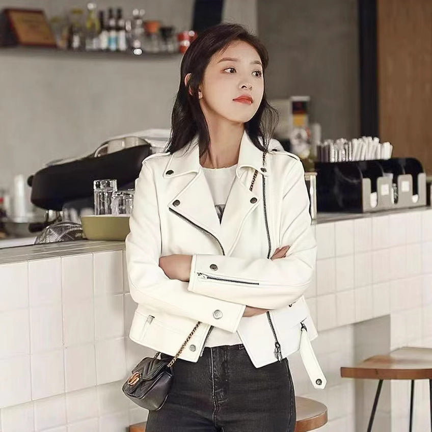 Short slim-fit PU leather jacket in black with front zipper and long sleeves