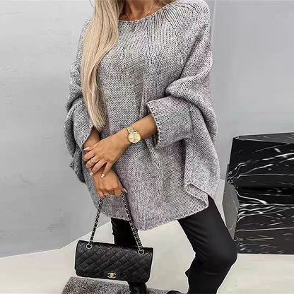 Women's winter oversized knitted pullover sweater with loose batwing sleeves and shawl-style neckline