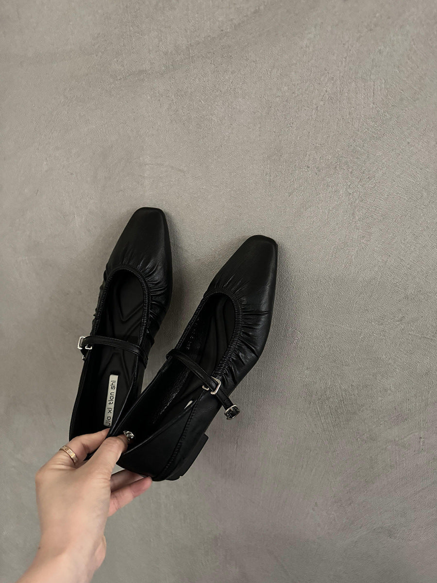 Women's silver flat dress shoes with a sleek metallic finish and comfortable low-profile design