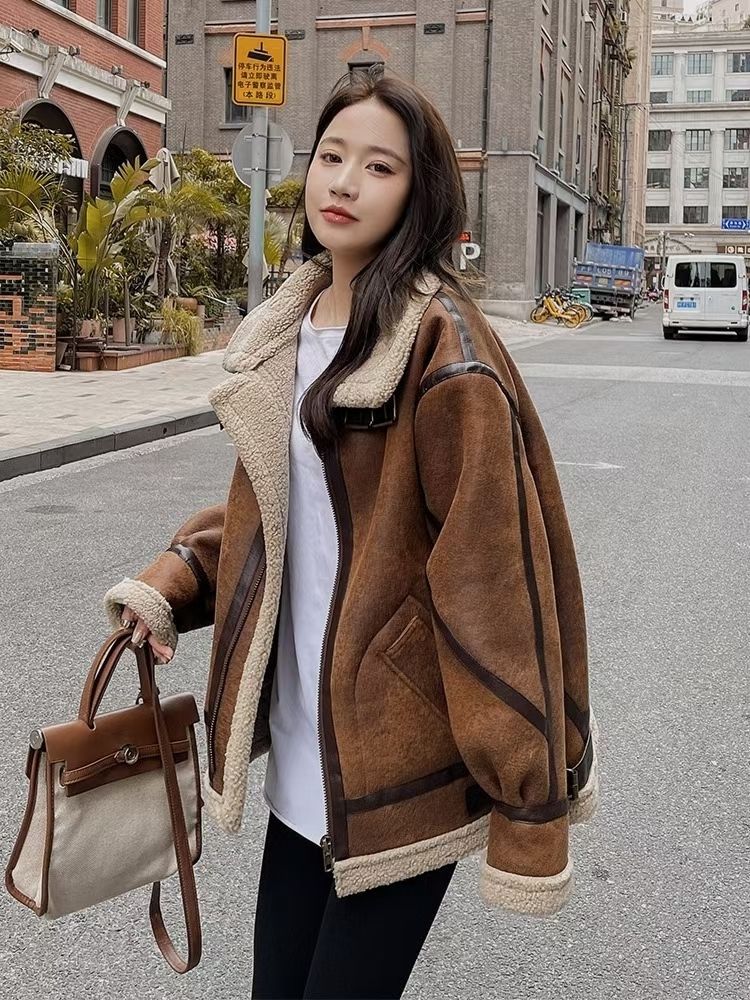 Lamb fur coat for women in a classic design, shown from the front