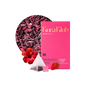 Kura Klub Green Tea with Hibiscus and Berry in a clear glass cup, showcasing vibrant red and green tea infusion.
