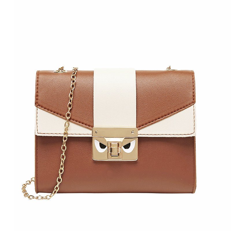Chic women's compact shoulder bag by BACKUPMYFILESNOW® featuring sleek design and adjustable strap, perfect for everyday use.